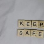 white and black number print textile - keep yourself safe