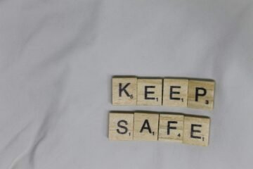 white and black number print textile - keep yourself safe